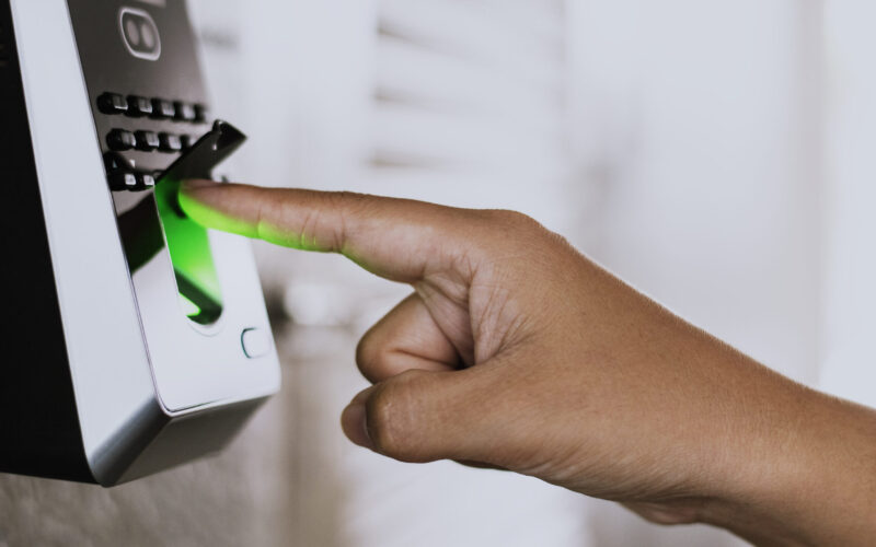 Scanning finger on a coronavirus contaminated fingerprint access control